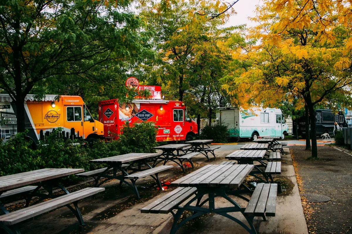 Food trucks lined up at an outdoor market